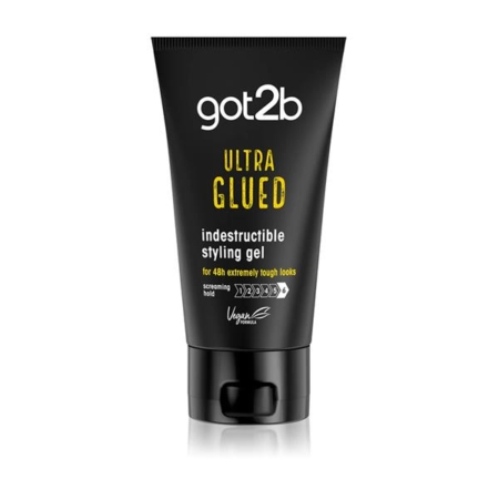 Un tube noir de Got2b Ultra Glued Gel Coiffant Fixation Extrême de 150 ml, conçu pour une tenue extrême et des coiffures audacieuses, est présenté debout sur un fond blanc. Dakar