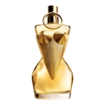 Un flacon de parfum doré en forme de torse féminin stylisé, présentant un buste sculpté orné de détails en spirale et un design géométrique évasé, inspiré de l'eau de parfum rechargeable « Gaultier Divine » de Jean Paul Gaultier, format 50 ml. Dakar