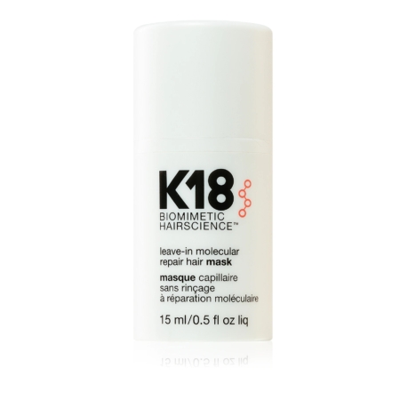 Un flacon cylindrique blanc de « K18 Masque Capillaire Réparateur Moléculaire Soin Sans Rinçage 50 ml (Copie) », orné d’une inscription en noir et rouge, offre un soin réparateur moléculaire avancé sans rinçage pour des cheveux plus sains. Dakar
