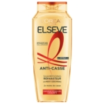 Un flacon de shampoing réparateur anti-casse Elseve de L'Oréal Paris, destiné aux cheveux fragiles et cassants, doté d'une étiquette dorée et orange rehaussée de touches rouges et comportant un texte en français décrivant ses propriétés. Dakar