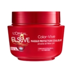 Un pot rouge de masque capillaire L'Oréal Paris Elseve Color Vive « Masque Protection Couleur » de 310 ml, destiné aux cheveux colorés, portant la mention « Masque Protection Couleur », avec un filtre UV et des propriétés à base de pivoine décrites en français. Dakar