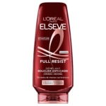 Un flacon rouge de l'après-shampoing Elseve Full Resist de L'Oréal Paris, à base d'aminexil et de biotine, destiné aux cheveux fragiles et sujets à la chute. Le texte figurant sur le flacon met en avant ses bienfaits en matière de réduction de la casse et de démêlage. Dakar