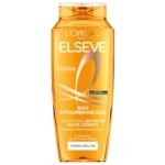 Un flacon de shampoing Elseve de L'Oréal Paris, portant la mention « Huile Extraordinaire Coco », destiné aux cheveux secs et fins. Le flacon est orange, avec des inscriptions en blanc et en doré. Dakar