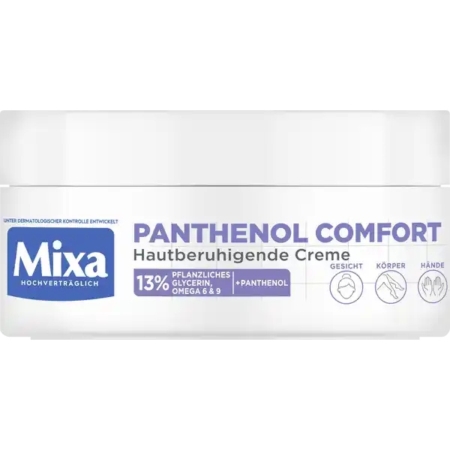 Un flacon blanc portant la mention « Mixa Panthenol Comfort Crème Apaisante Multi-Usages 250 ml » pour le visage, le corps et les mains. L'emballage met en avant une formule apaisante contenant 13 % de glycérine végétale, des oméga 6 et 9, ainsi que du panthénol. Orné de touches de bleu, de violet et de blanc, ce produit est également connu sous le nom de Mixa Panthenol Comfort Hautberuhigende Creme. Dakar