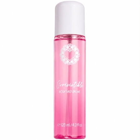 Un flacon rose de 120 ml (4,0 fl oz) de la brume pour le corps « Musc Intime Brume Corps Musc Blanc L'Irrésistible », doté d'un bouchon blanc et orné d'un cœur blanc décoratif sur le devant. Dakar