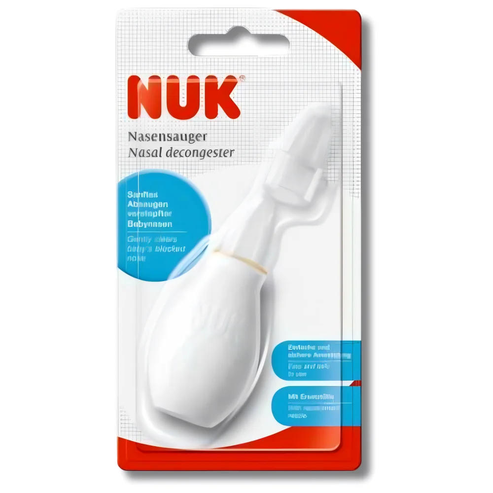 Le « Nuk Aspirateur Nasal Bébé Mouche Bébé Manuel » est un décongestionnant nasal manuel de couleur blanche, conçu pour les bébés. Il est présenté dans un emballage rouge, bleu et blanc comportant des informations sur le produit en anglais et en allemand. Cet appareil manuel doux offre un moyen sûr et efficace de dégager les voies nasales de votre bébé. Dakar