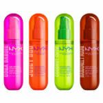 Quatre flacons aux couleurs vives de Nyx Brume Corps et Cheveux Parfum Longue Durée 80 ml sont alignés : rose (Yoga Daddie), orange (Juicy Boo), vert (Coconut Cutie) et rouge (Manehattan). Dakar