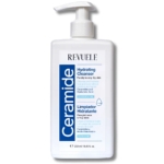 Un flacon pompe blanc de « Revuele Nettoyant Doux aux Céramides et Urée Visage et Corps » de 250 ml, doté d'une étiquette bleue et blanche rédigée en anglais et en espagnol, conçu pour les peaux sèches à très sèches et formulé à base de céramides et d'acide hyaluronique. Dakar