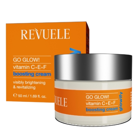 Un pot de 50 ml de « Revuele Crème Éclaircissante Visage Revitalisante et Illuminatrice Glowify Go Glow ! » est présenté devant son coffret orange vif ; tous deux comportent des informations sur ses bienfaits illuminateurs et revitalisants. Dakar